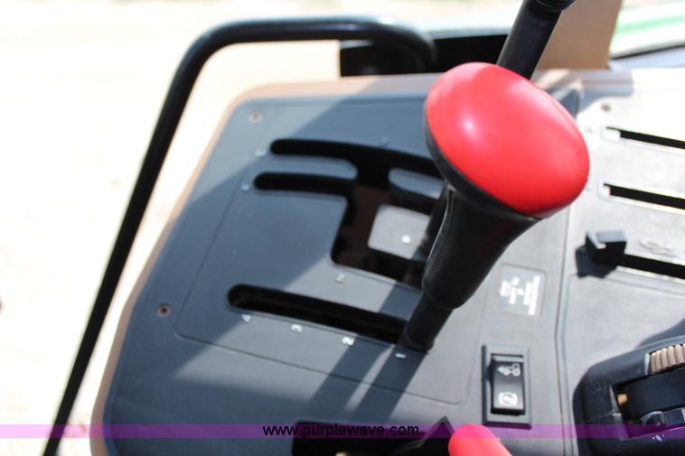 image for item J1089 1997 John Deere 6400 MFWD tractor