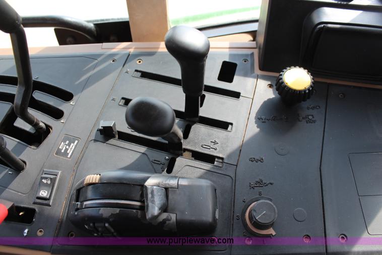 image for item J1089 1997 John Deere 6400 MFWD tractor