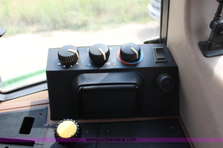 image for item J1089 1997 John Deere 6400 MFWD tractor