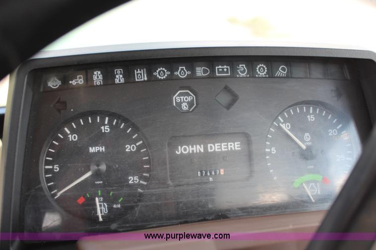 image for item J1089 1997 John Deere 6400 MFWD tractor
