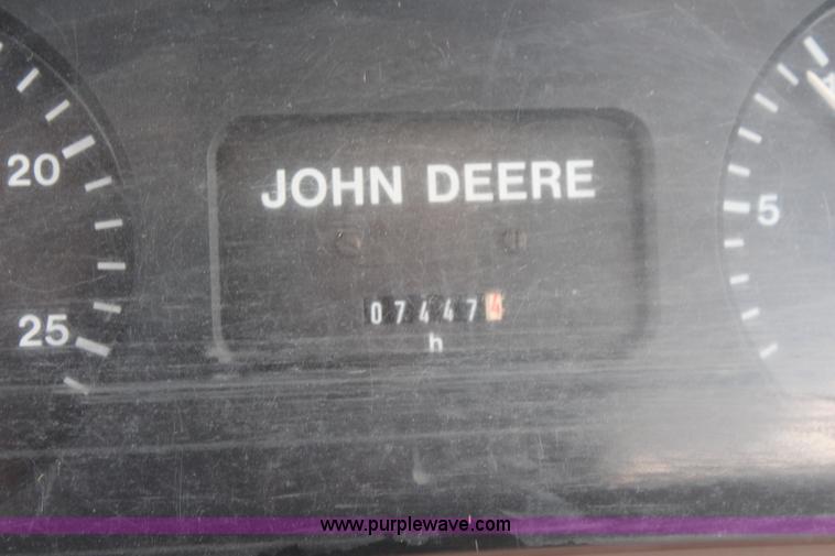 image for item J1089 1997 John Deere 6400 MFWD tractor