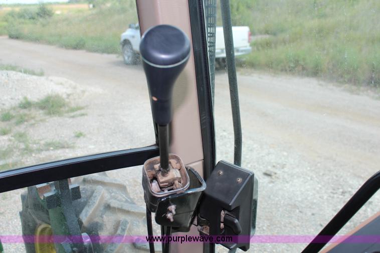 image for item J1089 1997 John Deere 6400 MFWD tractor