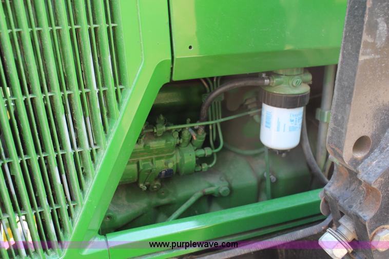 image for item J1089 1997 John Deere 6400 MFWD tractor