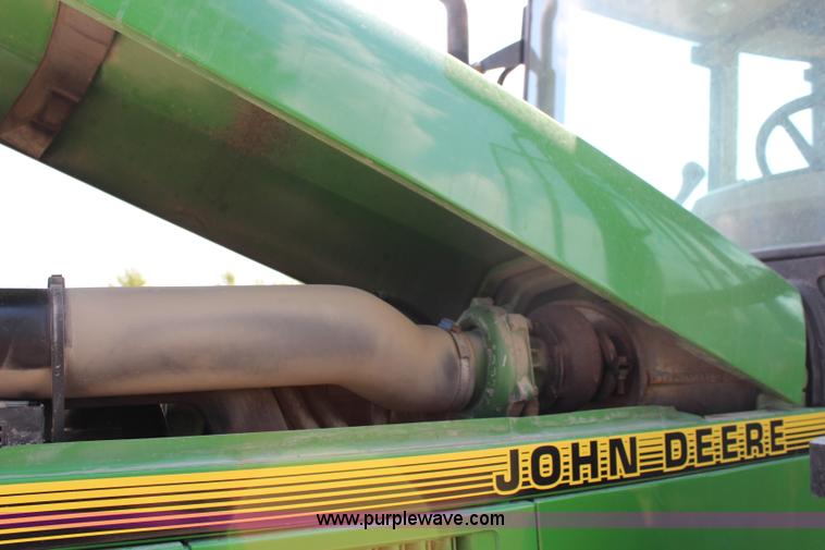 image for item J1089 1997 John Deere 6400 MFWD tractor