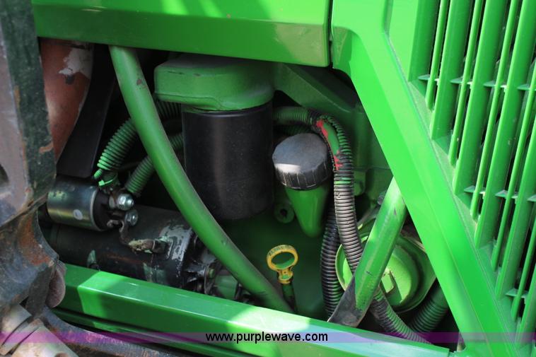 image for item J1089 1997 John Deere 6400 MFWD tractor