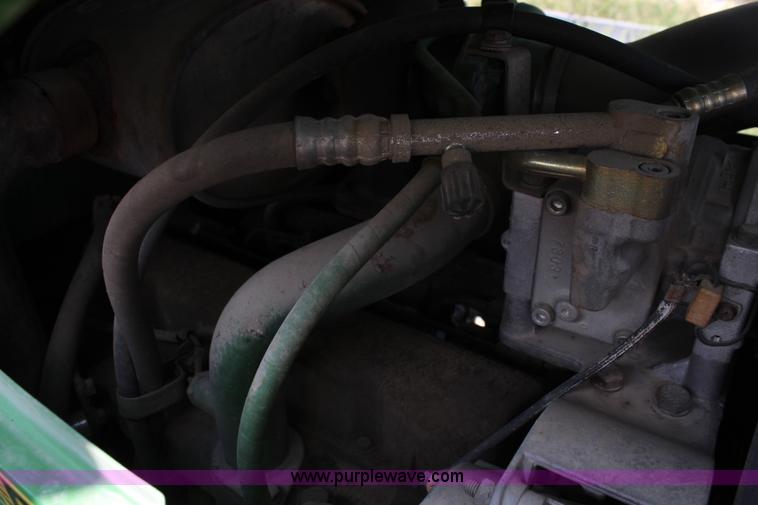 image for item J1089 1997 John Deere 6400 MFWD tractor