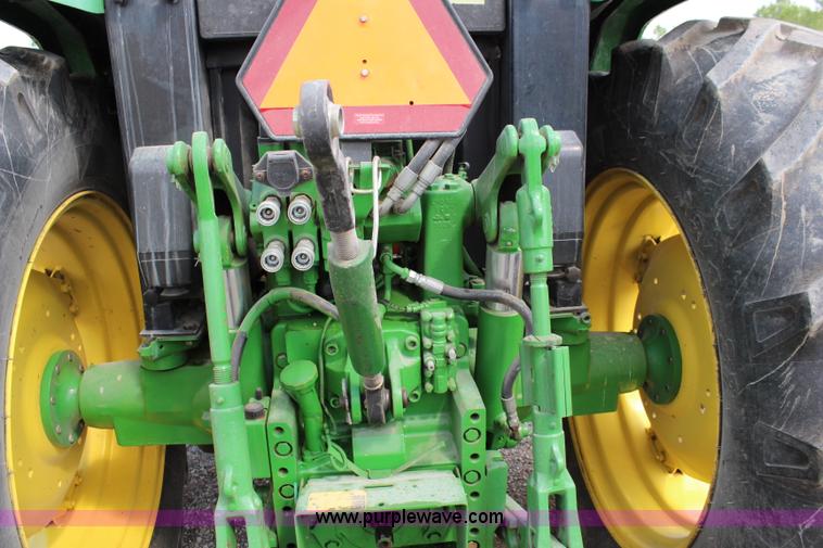 image for item J1089 1997 John Deere 6400 MFWD tractor