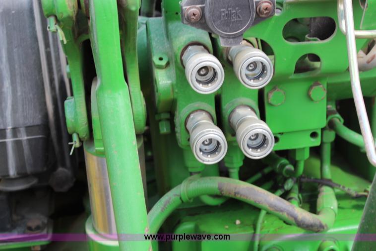 image for item J1089 1997 John Deere 6400 MFWD tractor