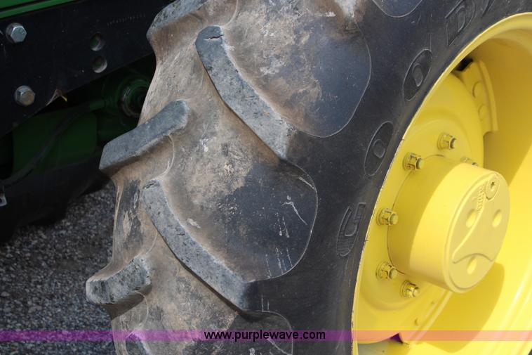 image for item J1089 1997 John Deere 6400 MFWD tractor