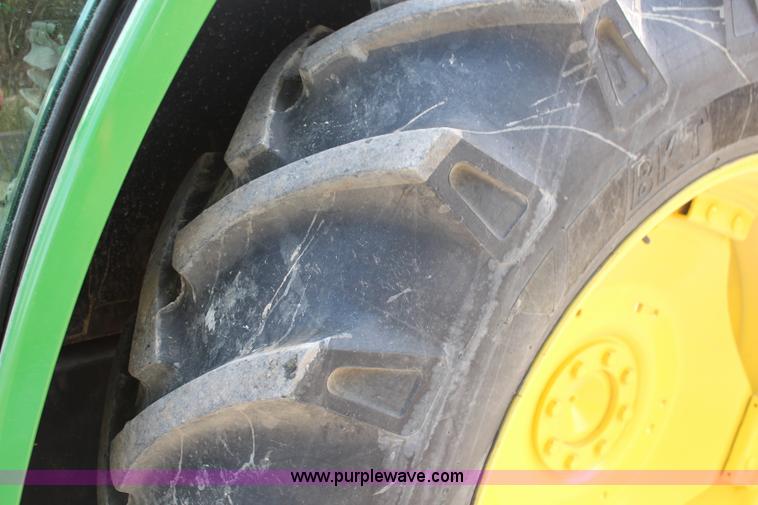 image for item J1089 1997 John Deere 6400 MFWD tractor