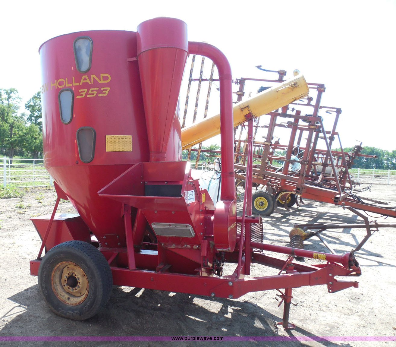 New Holland 353 grinder mixer in Kinsley, KS Item I3457 sold Purple