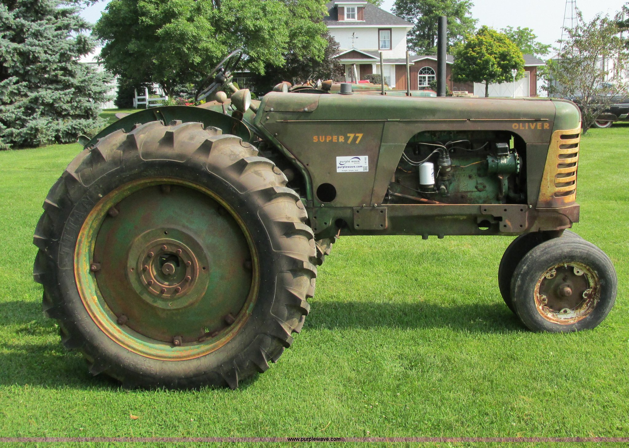 Oliver Super 77 tractor in Atalissa, IA Item I4140 sold Purple Wave
