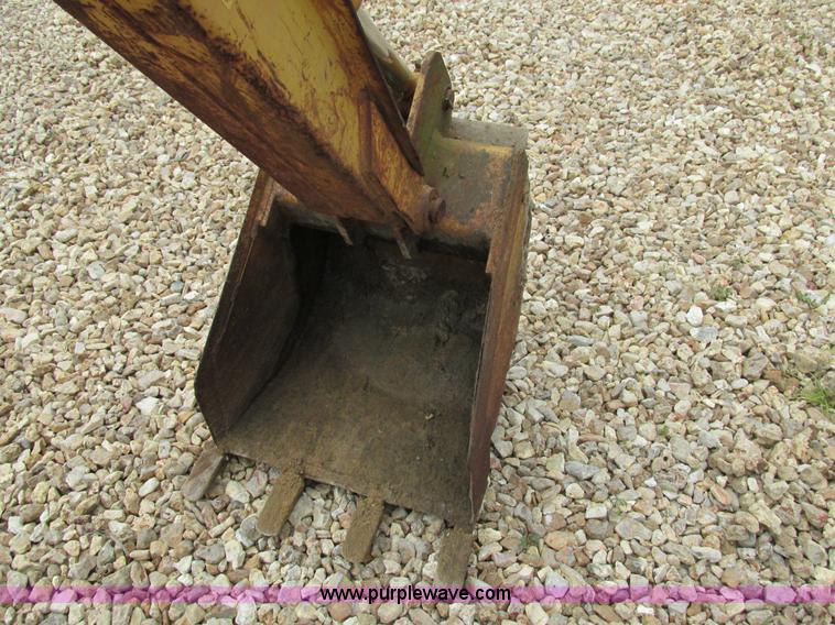 image for item AW9979 Case D100 skid steer backhoe attachment