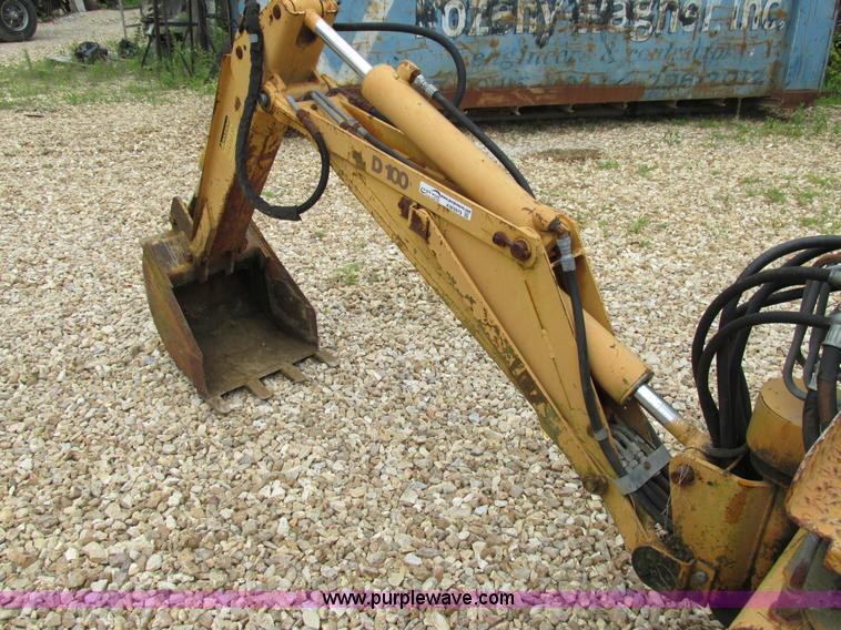 image for item AW9979 Case D100 skid steer backhoe attachment