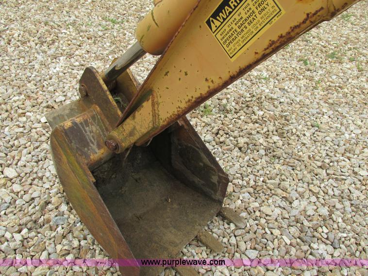 image for item AW9979 Case D100 skid steer backhoe attachment