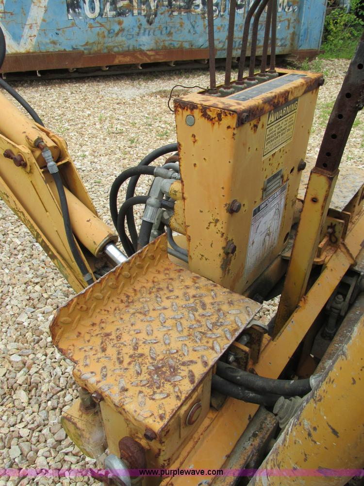 image for item AW9979 Case D100 skid steer backhoe attachment