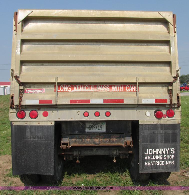 image for item F7159 1994 Fruehauf DAX-14-06D-F3-16 aluminum triple axle dump trailer