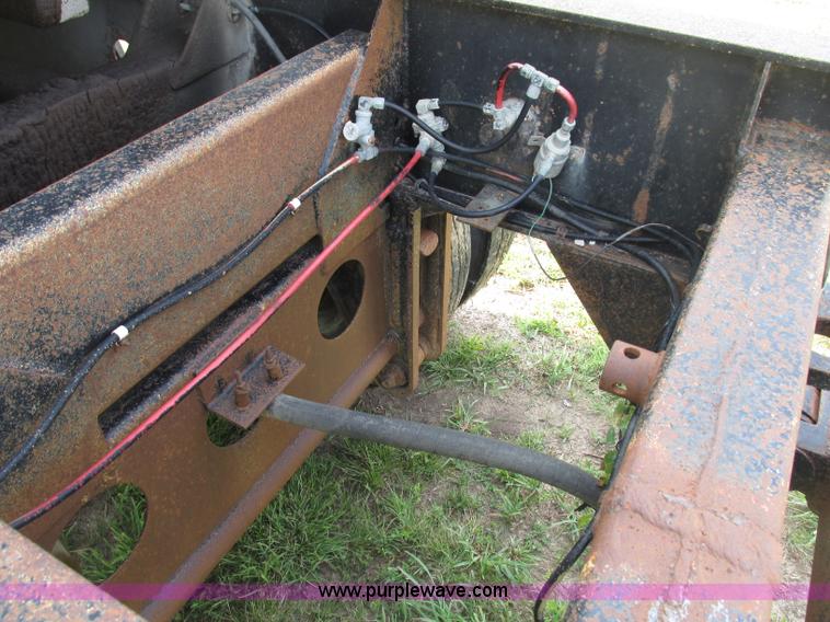 image for item F7159 1994 Fruehauf DAX-14-06D-F3-16 aluminum triple axle dump trailer