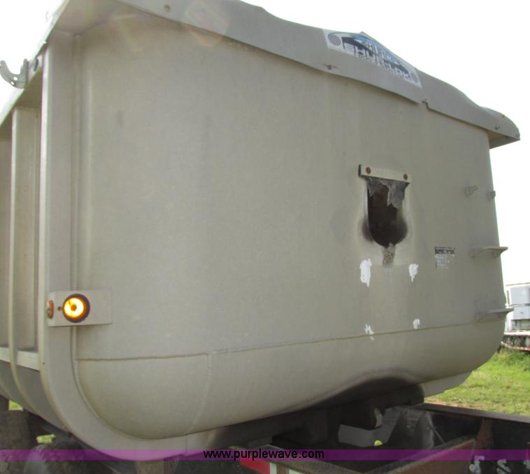 image for item F7159 1994 Fruehauf DAX-14-06D-F3-16 aluminum triple axle dump trailer