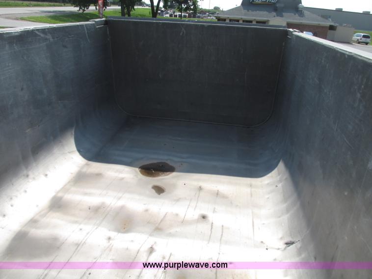 image for item F7159 1994 Fruehauf DAX-14-06D-F3-16 aluminum triple axle dump trailer