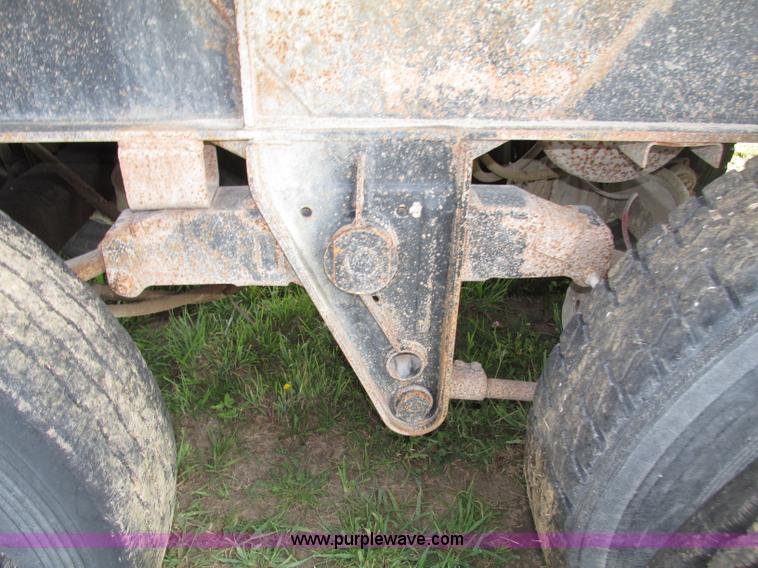 image for item F7159 1994 Fruehauf DAX-14-06D-F3-16 aluminum triple axle dump trailer