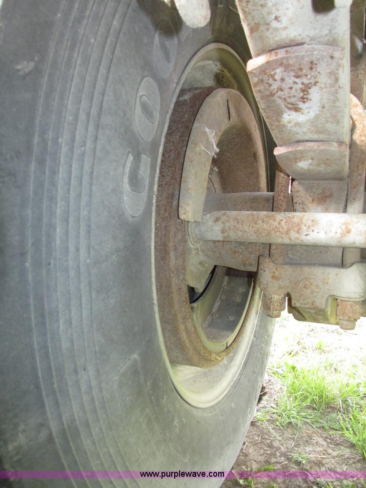 image for item F7159 1994 Fruehauf DAX-14-06D-F3-16 aluminum triple axle dump trailer