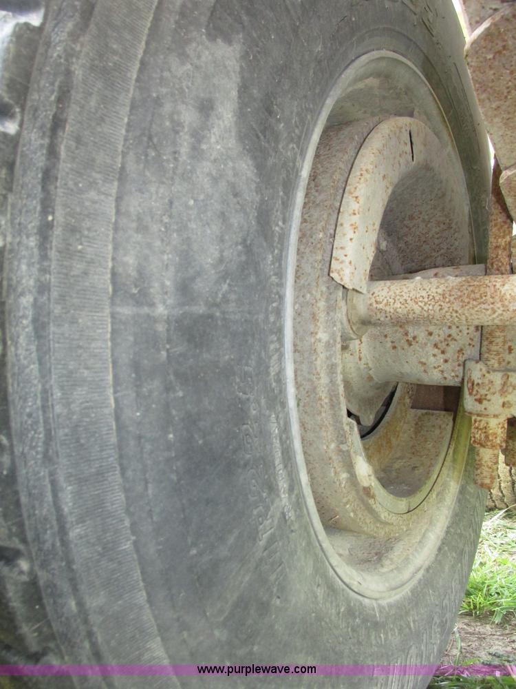 image for item F7159 1994 Fruehauf DAX-14-06D-F3-16 aluminum triple axle dump trailer