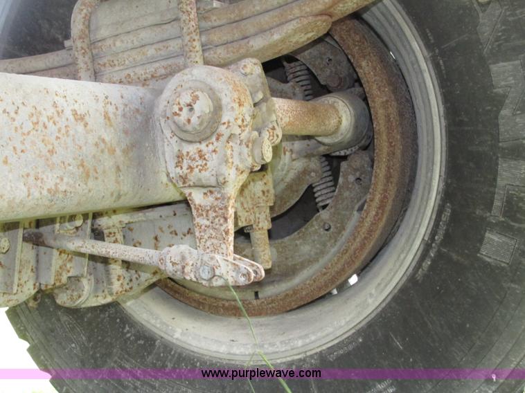 image for item F7159 1994 Fruehauf DAX-14-06D-F3-16 aluminum triple axle dump trailer