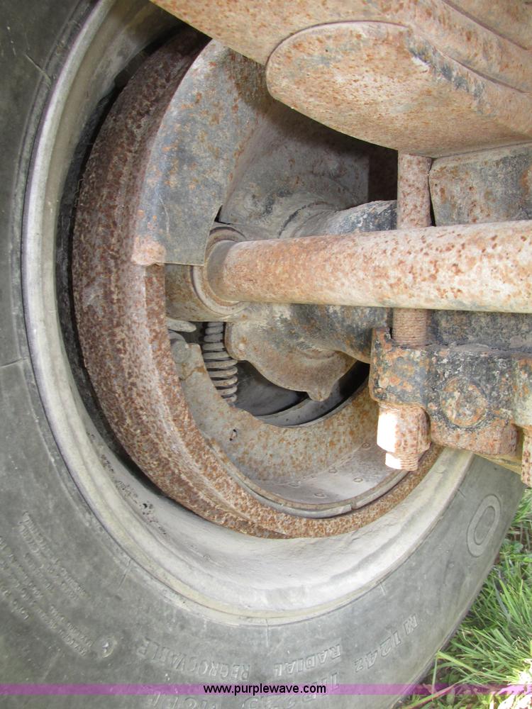 image for item F7159 1994 Fruehauf DAX-14-06D-F3-16 aluminum triple axle dump trailer