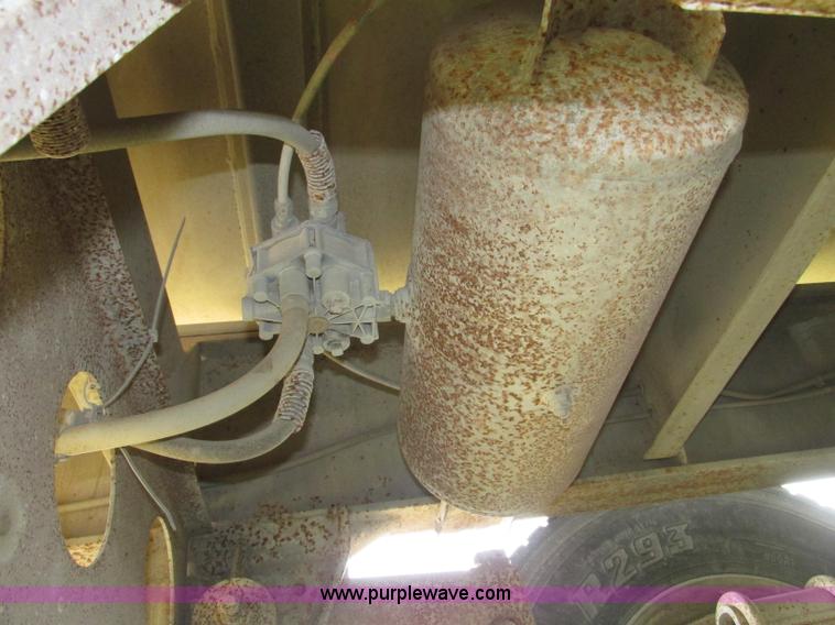 image for item F7159 1994 Fruehauf DAX-14-06D-F3-16 aluminum triple axle dump trailer