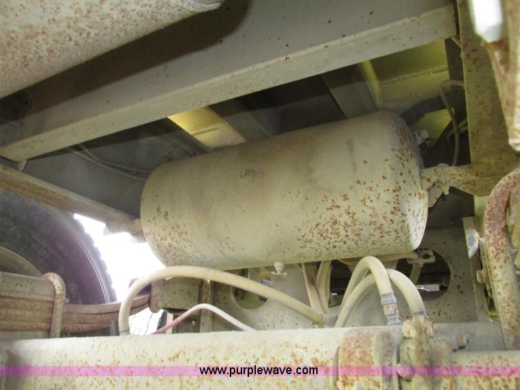 image for item F7159 1994 Fruehauf DAX-14-06D-F3-16 aluminum triple axle dump trailer