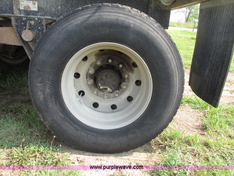 image for item F7159 1994 Fruehauf DAX-14-06D-F3-16 aluminum triple axle dump trailer