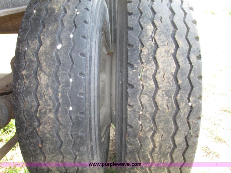 image for item F7159 1994 Fruehauf DAX-14-06D-F3-16 aluminum triple axle dump trailer