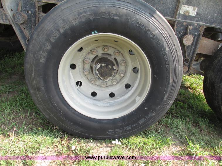 image for item F7159 1994 Fruehauf DAX-14-06D-F3-16 aluminum triple axle dump trailer