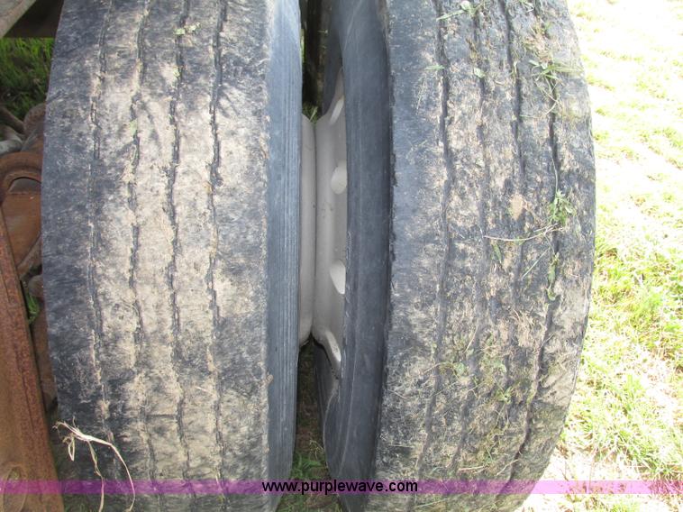 image for item F7159 1994 Fruehauf DAX-14-06D-F3-16 aluminum triple axle dump trailer