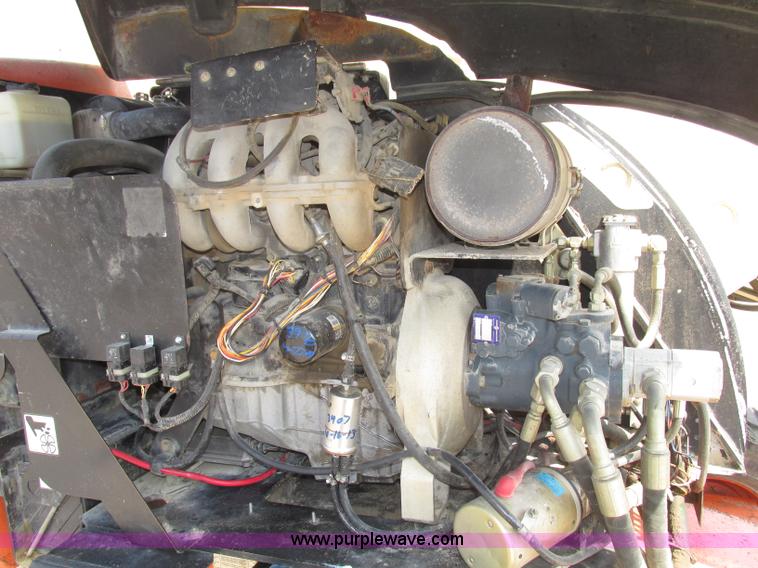 image for item F7474 2000 JLG 450A boom lift