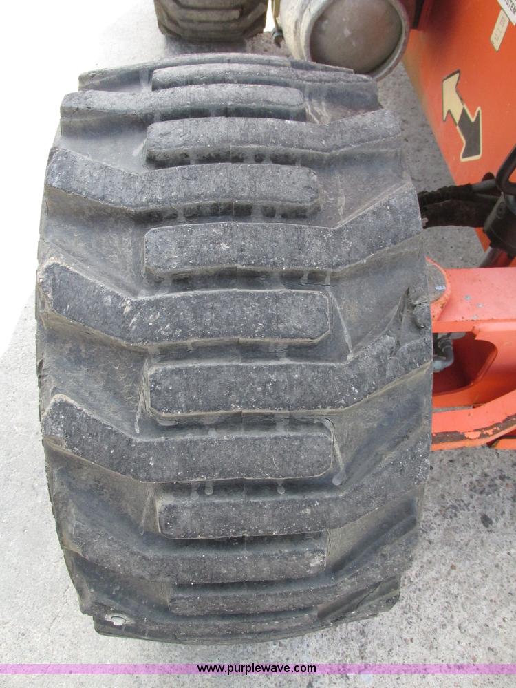 image for item F7474 2000 JLG 450A boom lift