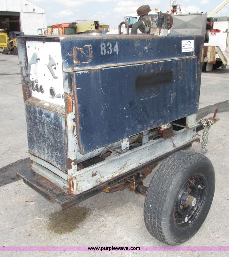 image for item F7476 Miller welder/generator
