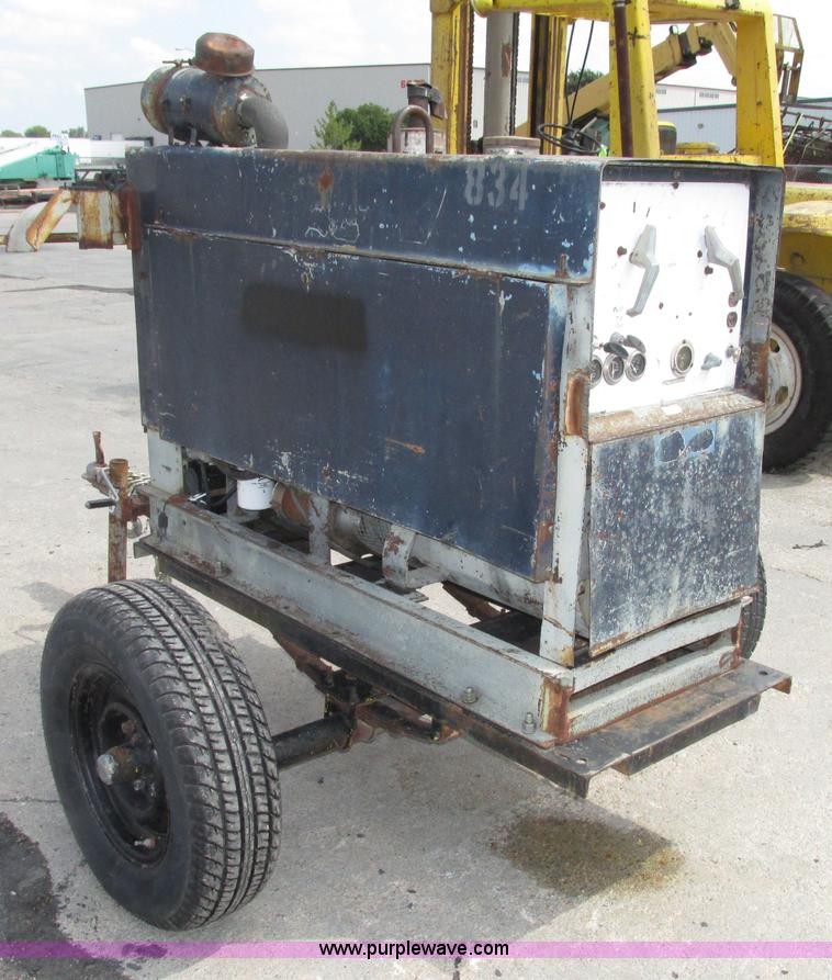 image for item F7476 Miller welder/generator