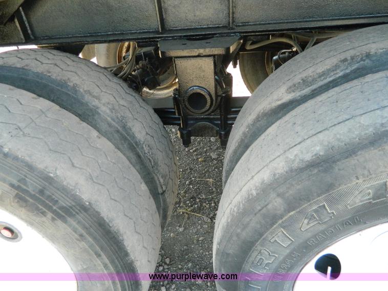 image for item H2437 1998 Travis end dump trailer