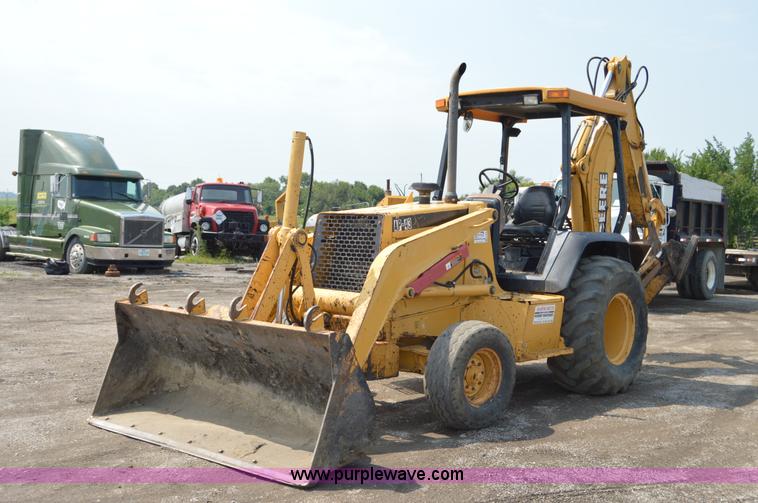 image for item H2828 1999 John Deere 310E backhoe