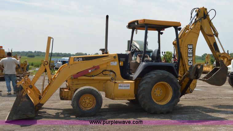 image for item H2828 1999 John Deere 310E backhoe