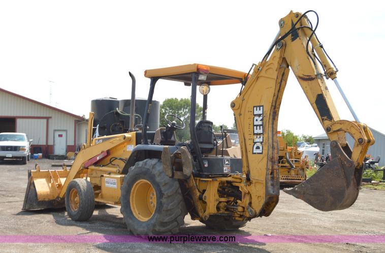 image for item H2828 1999 John Deere 310E backhoe