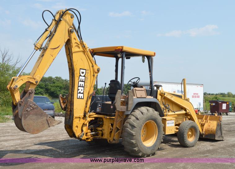image for item H2828 1999 John Deere 310E backhoe