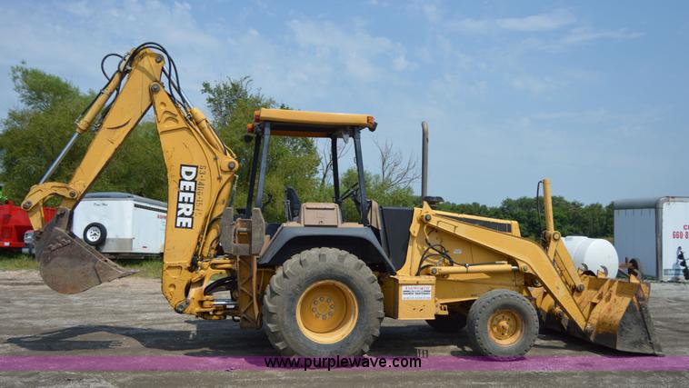 image for item H2828 1999 John Deere 310E backhoe