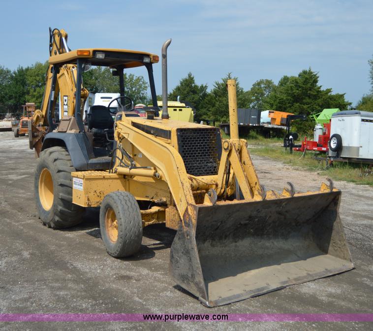 image for item H2828 1999 John Deere 310E backhoe