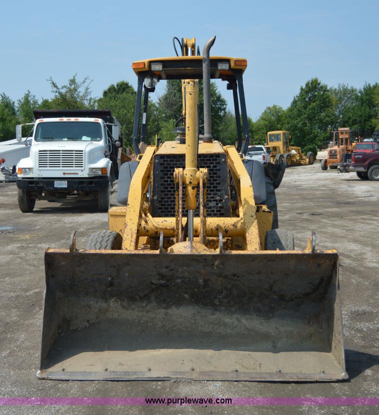 image for item H2828 1999 John Deere 310E backhoe