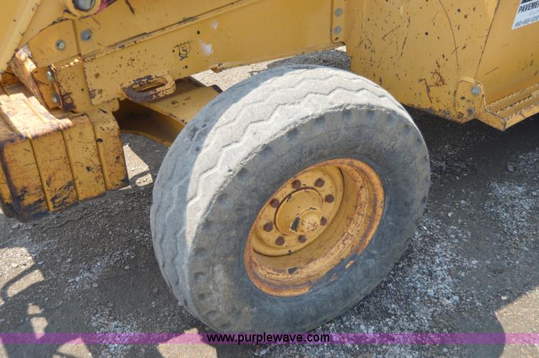 image for item H2828 1999 John Deere 310E backhoe