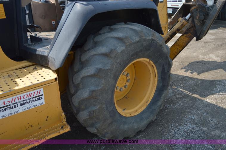 image for item H2828 1999 John Deere 310E backhoe