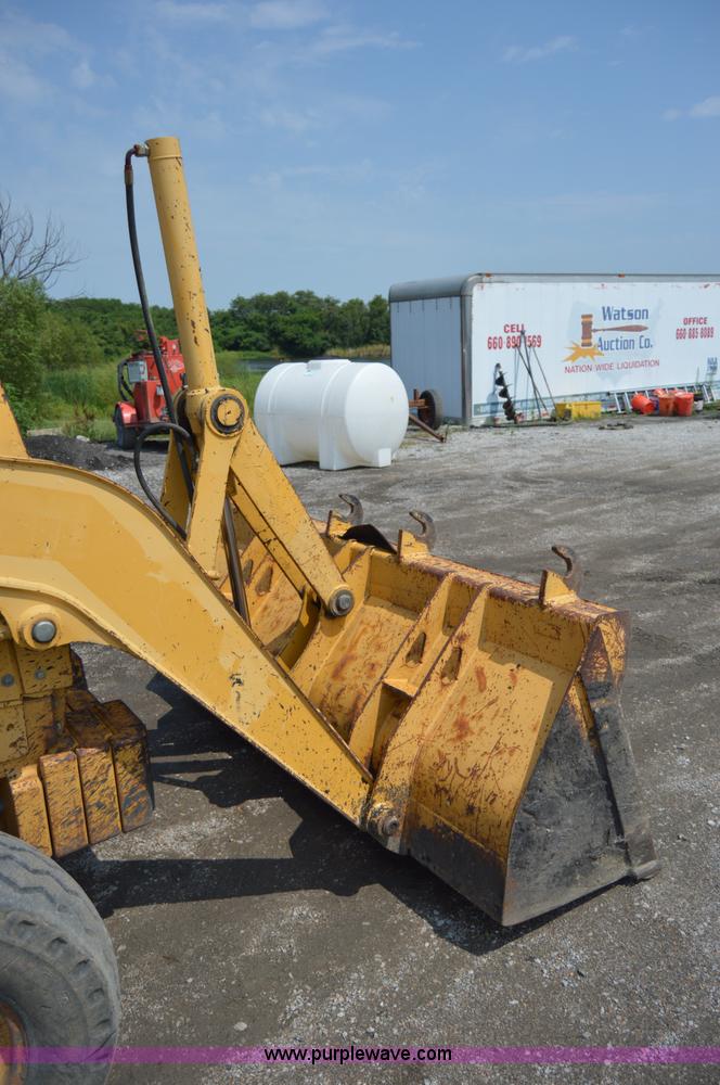 image for item H2828 1999 John Deere 310E backhoe